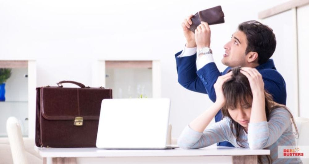 Worried couple facing financial stress, symbolising bankruptcy in Australia